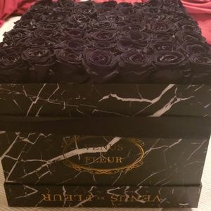 Black roses last a year in marble box
